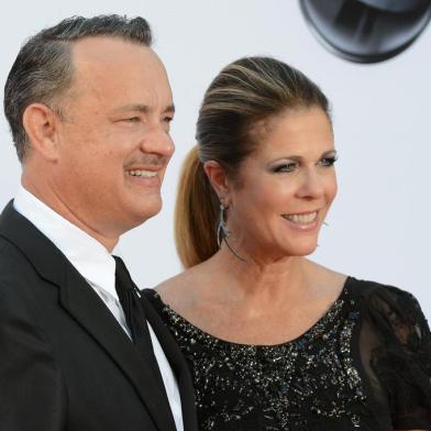 Actor Tom Hanks and actress Rita Wilson arrive for the 64th annual Prime Time Emmy Awards at the Nokia Theatre at LA Live in Los Angeles, California September 23, 2012.  AFP PHOTO / ROBYN BECK<!-- NICAID(8637230) -->