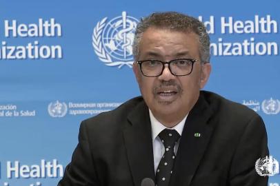 A tv grab taken from the World Health Organization website shows WHO Chief Tedros Adhanom Ghebreyesus delivering a virtual news briefing on COVID-19 (novel coronavirus) at the WHO headquarters in Geneva on March 23, 2020. - The new coronavirus pandemic is clearly accelerating, WHO chief warned on March 23, 2020, but stressed it was still possible to change the trajectory of the outbreak. (Photo by - / AFP)<!-- NICAID(14458830) -->