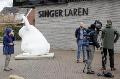 Singer Laren Museum Evert van Os speaks to the press outside the museum on March 30, 2020 in Laren, about 30 kilometres southeast of Amsterdam, closed to the public because of the COVID-19 pandemic, after th 1884 painting by Vincent van Gogh Parsonage Garden at Neunen in Spring was stolen. - The painting has an estimated value of between one to six million euros, local media said. The criminals entered the museum at around 3.15 am (0115 GMT) by breaking open a front glass door, police and Dutch news reports said. (Photo by Robin VAN LONKHUIJSEN / ANP / AFP) / Netherlands OUT<!-- NICAID(14464715) -->