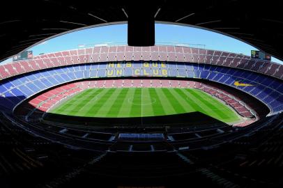 -Interior view taken on March 14, 2013 of the Camp Nou stadium in Barcelona.  AFP PHOTO / JOSEP LAGO (Photo by JOSEP LAGO / AFP)Editoria: SPOLocal: BarcelonaIndexador: JOSEP LAGOSecao: soccerFonte: AFP<!-- NICAID(14470395) -->