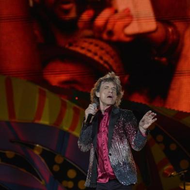  British singer and frontman of rock band The Rolling Stones Mick Jagger performs during a concert at Ciudad Deportiva in Havana, Cuba, on March 25, 2016. AFP PHOTO / YAMIL LAGE<!-- NICAID(12099660) -->