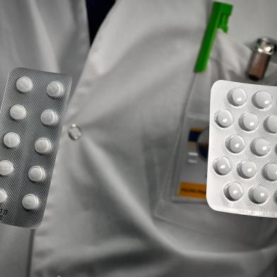  (FILES) In this file photo taken on February 26, 2020, medical staff shows o at the IHU Mediterranee Infection Institute in Marseille, packets of a Nivaquine, tablets containing chloroquine and Plaqueril, tablets containing hydroxychloroquine, drugs that has shown signs of effectiveness against coronavirus. - On March 29, 2020,a limited emergency-use authorization for two antimalarial drugs touted as game-changers by President Donald Trump has been issued by the US Food and Drug Administration to treat coronavirus patients. In a statement published Sunday, the US Department of Health and Human Services detailed recent donations of medicine to a national stockpile -- including chloroquine and hydroxychloroquine, both being investigated as potential COVID-19 treatments. (Photo by GERARD JULIEN / AFP)Editoria: HTHLocal: MarseilleIndexador: GERARD JULIENSecao: diseaseFonte: AFPFotógrafo: STF<!-- NICAID(14467794) -->