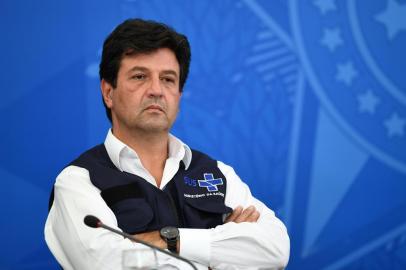 Brazils Health Minister Luiz Henrique Mandetta is seen during a press conference to announce new measures to combat the COVID-19 pandemic at Planalto Palace in Brasilia, on April 3, 2020. (Photo by EVARISTO SA / AFP)<!-- NICAID(14474722) -->