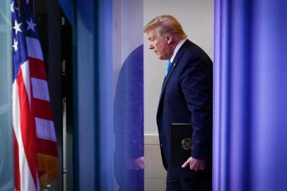 US President Donald Trump arrives for the daily briefing on the novel coronavirus, COVID-19, in the Brady Briefing Room at the White House on April 7, 2020, in Washington, DC. (Photo by MANDEL NGAN / AFP)<!-- NICAID(14471897) -->