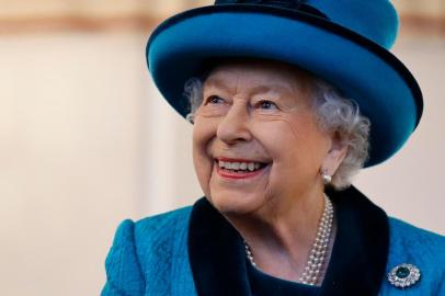 (FILES) In this file photo taken on November 26, 2019 Britain's Queen Elizabeth II visits the new headquarters of the Royal Philatelic society in London. - Britain's Queen Elizabeth II will celebrate her birthday discreetly next week, without the traditional salutes of honour, which she considers "inappropriate" in the midst of the coronavirus pandemic, which has killed more than 14,000 people in the United Kingdom, said a source from the Buckingham Palace at AFP. (Photo by Tolga Akmen / POOL / AFP)<!-- NICAID(14482523) -->