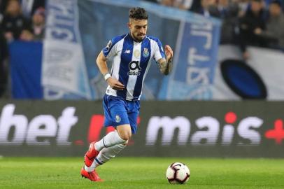  Porto's Brazilian defender Alex Telles celebrates a goal during the UEFA Champions League round of 16 second leg football match between FC Porto and AS Roma at the Dragao stadium in Porto on March 6, 2019. 