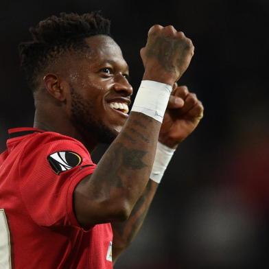 Manchester Uniteds Brazilian midfielder Fred reacts at the final whistle during the UEFA Europa League round of 32 second leg football match between Manchester United and Club Brugge at Old Trafford in Manchester, north west England, on February 27, 2020. (Photo by Oli SCARFF / AFP)