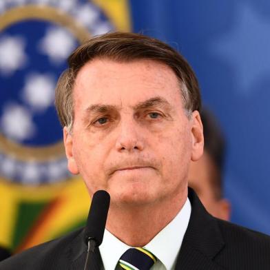  Brazils President Jair Bolsonaro delivers a press conference in Brasilia, Brazil, on April 24, 2020. - Brazilian Minister of Justice and Public Security, Sergio Moro, announce his resignation on Friday after Brazilian President Jair Bolsonaro dismissed the head of the Brazilian Federal Police, according to sources close to the popular former anti-corruption judge. (Photo by EVARISTO SA / AFP)Editoria: POLLocal: BrasíliaIndexador: EVARISTO SASecao: politics (general)Fonte: AFPFotógrafo: STF<!-- NICAID(14485691) -->