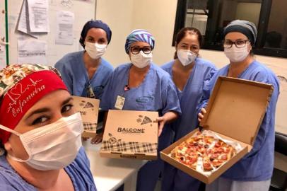 Pizzaria Balcone distribui pizzas para funcionários do Grupo Hospitalar Conceição<!-- NICAID(14491495) -->