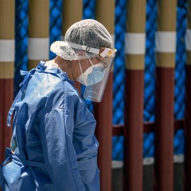 A staffer walks inside the General Hospital for COVID-19 coronavirus care in Mexico City on May 4, 2020. (Photo by PEDRO PARDO / AFP)<!-- NICAID(14492399) -->