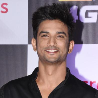 (FILES) In this file photo taken on December 16, 2018 Indian Bollywood actor Sushant Singh Rajput poses for a picture as he attends the 'Star Screen Awards' ceremony in Mumbai. - A young Bollywood heartthrob lauded for his portrayal of cricket star M.S. Dhoni on the silver screen has taken his own life, Mumbai police said on June 14, the latest in a string of deaths to rock India's entertainment industry. "Police found Sushant Singh Rajput's body at his residence Sunday afternoon," Mumbai police spokesman Pranay Ashok told AFP, confirming that the 34-year-old had taken his own life. Rajput, renowned for his numerous hits on the big and small screens, reportedly battled depression. (Photo by Sujit Jaiswal / AFP)