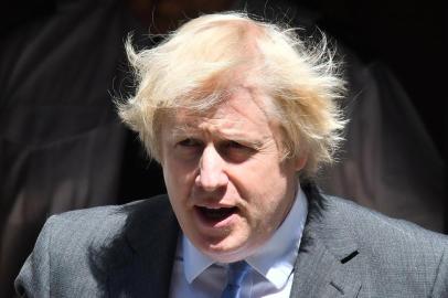 Britains Prime Minister Boris Johnson leaves 10 Downing Street in central London on June 23, 2020, headed to the House of Commons where he is set to make a statement. - Prime Minister Boris Johnson is expected to announce plans for pubs and restaurants on Tuesday, with the date of July 4 already pencilled in for them to restart. (Photo by JUSTIN TALLIS / AFP)<!-- NICAID(14528890) -->