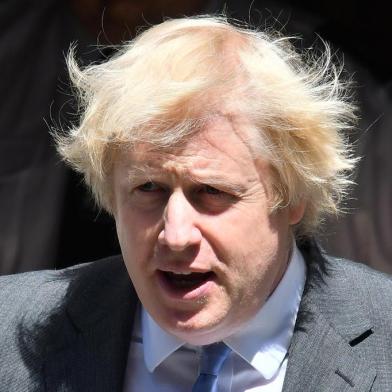 Britains Prime Minister Boris Johnson leaves 10 Downing Street in central London on June 23, 2020, headed to the House of Commons where he is set to make a statement. - Prime Minister Boris Johnson is expected to announce plans for pubs and restaurants on Tuesday, with the date of July 4 already pencilled in for them to restart. (Photo by JUSTIN TALLIS / AFP)<!-- NICAID(14528890) -->