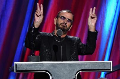 CLEVELAND, OH - APRIL 18: Inductee Ring Starr performs onstage during the 30th Annual Rock And Roll Hall Of Fame Induction Ceremony at Public Hall on April 18, 2015 in Cleveland, Ohio.   Mike Coppola/Getty Images/AFP<!-- NICAID(11350785) -->