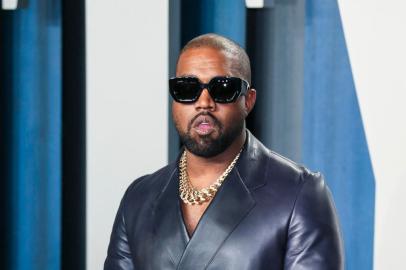 (FILES) In this file photo Kanye West attends the 2020 Vanity Fair Oscar Party following the 92nd annual Oscars at The Wallis Annenberg Center for the Performing Arts in Beverly Hills on February 9, 2020. - Entertainment mogul Kanye West on June 30, 2020 released a new song, Wash Us In the Blood, along with an accompanying video including imagery from recent anti-racism protests. The new track, the first released from the born-again rappers planned 10th album Gods Country, features lyrics with heavily biblical overtones, in line with his musical turn to Christianity in recent years. (Photo by Jean-Baptiste Lacroix / AFP)<!-- NICAID(14538337) -->