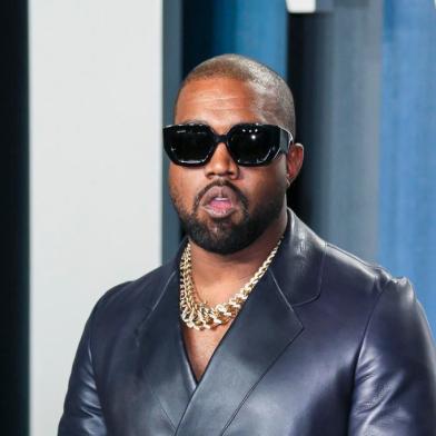 (FILES) In this file photo Kanye West attends the 2020 Vanity Fair Oscar Party following the 92nd annual Oscars at The Wallis Annenberg Center for the Performing Arts in Beverly Hills on February 9, 2020. - Entertainment mogul Kanye West on June 30, 2020 released a new song, Wash Us In the Blood, along with an accompanying video including imagery from recent anti-racism protests. The new track, the first released from the born-again rappers planned 10th album Gods Country, features lyrics with heavily biblical overtones, in line with his musical turn to Christianity in recent years. (Photo by Jean-Baptiste Lacroix / AFP)<!-- NICAID(14538337) -->