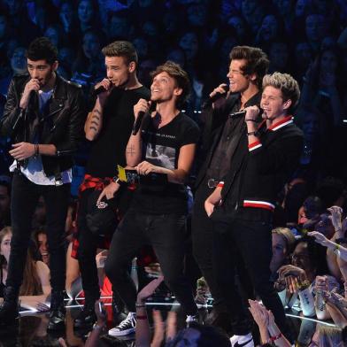 2013 MTV Video Music Awards - ShowNEW YORK, NY - AUGUST 25: One Direction speaks onstage during the 2013 MTV Video Music Awards at the Barclays Center on August 25, 2013 in the Brooklyn borough of New York City.   Rick Diamond/Getty Images for MTV/AFPEditoria: ACELocal: New YorkIndexador: RICK DIAMONDSecao: MusicFonte: GETTY IMAGES NORTH AMERICAFotógrafo: STF<!-- NICAID(9707381) -->