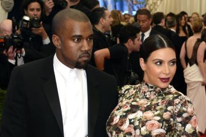 Kim Kardashian and Kanye West  attend the Costume Institute Benefit at The Metropolitan Museum of Art May 6, 2013, celebrating the opening of Punk: Chaos to Couture.  AFP PHOTO / TIMOTHY A. CLARY<!-- NICAID(9355348) -->