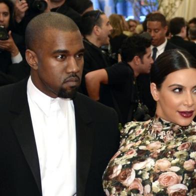 Kim Kardashian and Kanye West  attend the Costume Institute Benefit at The Metropolitan Museum of Art May 6, 2013, celebrating the opening of Punk: Chaos to Couture.  AFP PHOTO / TIMOTHY A. CLARY<!-- NICAID(9355348) -->