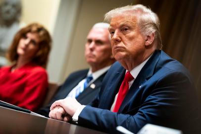 WASHINGTON, DC - AUGUST 03: U.S. President Donald Trump makes remarks as he meets with U.S. Tech Workers and signs an Executive Order on Hiring Americans, in the Cabinet Room of the White House on August 3, 2020 in Washington, DC. The executive order bans federal agencies from firing American citizens or green card holders and hiring foreign workers to do their jobs.   Doug Mills-Pool/Getty Images/AFP<!-- NICAID(14559568) -->