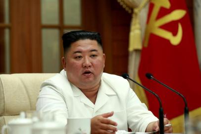 In this picture taken on August 25, 2020 and released from North Koreas official Korean Central News Agency (KCNA) on August 26, 2020 North Korean leader Kim Jong Un speaks during a meeting of the political bureau and the executive policy council of the 7th central committee of the Workers Party of Korea (WPK) in Pyongyang. (Photo by STR / various sources / AFP) / South Korea OUT / ---EDITORS NOTE--- RESTRICTED TO EDITORIAL USE - MANDATORY CREDIT AFP PHOTO/KCNA VIA KNS - NO MARKETING NO ADVERTISING CAMPAIGNS - DISTRIBUTED AS A SERVICE TO CLIENTS / THIS PICTURE WAS MADE AVAILABLE BY A THIRD PARTY. AFP CAN NOT INDEPENDENTLY VERIFY THE AUTHENTICITY, LOCATION, DATE AND CONTENT OF THIS IMAGE --- / <!-- NICAID(14576617) -->