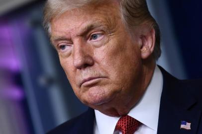 (FILES) In this file photo US President Donald Trump speaks to the press in the Brady Briefing Room of the White House in Washington, DC, on August 10, 2020. - President Donald Trump said on August 11, 2020 that some men may feel insulted by his Democratic rival Joe Bidens committment to choose a woman as his vice presidential candidate.He roped himself into a certain group of people, Trump told Fox Sports Radio in an early morning phone-in interview.Some people would say men are insulted by that and some people would say it is fine, Trump said. (Photo by Brendan Smialowski / AFP)<!-- NICAID(14565276) -->