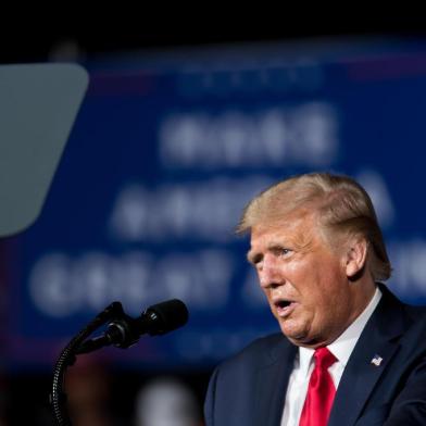 WINSTON SALEM, NC - SEPTEMBER 08: President Donald Trump addresses a crowd during a campaign rally at Smith Reynolds Airport on September 8, 2020 in Winston Salem, North Carolina. The president also made a campaign stop in South Florida on Tuesday.   Sean Rayford/Getty Images/AFP<!-- NICAID(14587566) -->