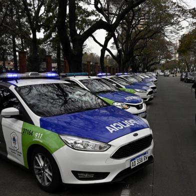 Buenos Aires province police cars remain parked outside the presidential residence in Olivos, Buenos Aires province, Argentina, on September 9, 2020, during a police demo in demand of a rise in their wages and better working conditions, amid the new coronavirus pandemic. (Photo by JUAN MABROMATA / AFP)<!-- NICAID(14588620) -->