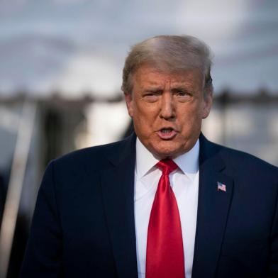 WASHINGTON, DC - SEPTEMBER 19: U.S. President Donald Trump speaks to members of the press prior to his departure from the White House on September 19, 2020 in Washington, DC. President Trump is traveling to North Carolina for a campaign rally.   Sarah Silbiger/Getty Images/AFP<!-- NICAID(14596556) -->