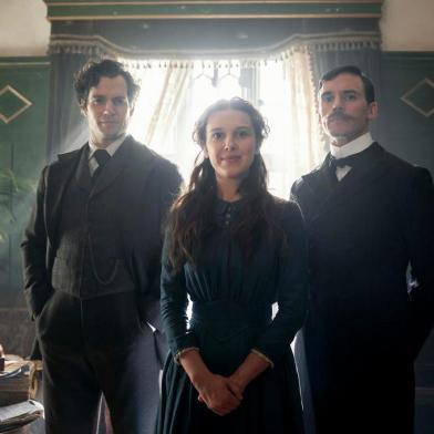 ENOLA HOLMES (L to R) HENRY CAVILL as SHERLOCK HOLMES, MILLIE BOBBY BROWN as ENOLA HOLMES, SAM CLAFLIN as MYCROFT HOLMES. Cr. ROBERT VIGLASKI /LEGENDARY Â©2020<!-- NICAID(14598721) -->