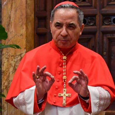 (FILES) In this file photo taken on June 28, 2018 Newly elevated cardinal, Giovanni Angelo Becciu from Italy, attends the courtesy visit of relatives following a consistory for the creation of new cardinals on June 28, 2018 in the Apostolic Palace at St Peters basilica in Vatican. - Cardinal Angelo Becciu, the head of the vaticans saint-making office, resigned, the Vatican said in a statement on September 24, 2020. Becciu was reportedly indirectly implicated in a financial scandal involving the Vaticans investment in a London real estate deal. (Photo by ANDREAS SOLARO / AFP)<!-- NICAID(14600876) -->