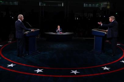 CLEVELAND, OHIO - SEPTEMBER 29: U.S. President Donald Trump (R) and Democratic presidential nominee Joe Biden participate in the first presidential debate at the Health Education Campus of Case Western Reserve University on September 29, 2020 in Cleveland, Ohio. This is the first of three planned debates between the two candidates in the lead up to the election on November 3.   Olivier Douliery-Pool/Getty Images/AFP<!-- NICAID(14605032) -->