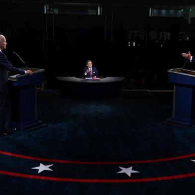 CLEVELAND, OHIO - SEPTEMBER 29: U.S. President Donald Trump (R) and Democratic presidential nominee Joe Biden participate in the first presidential debate at the Health Education Campus of Case Western Reserve University on September 29, 2020 in Cleveland, Ohio. This is the first of three planned debates between the two candidates in the lead up to the election on November 3.   Olivier Douliery-Pool/Getty Images/AFP<!-- NICAID(14605032) -->