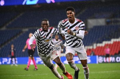  Manchester Uniteds English Forward Marcus Rashford (R) celebrates after scoring a goal  during the UEFA Europa League Group H first-leg football match between Paris Saint-Germain (PSG) and Manchester United at the Parc des Princes stadium in Paris on October 20, 2020. (Photo by FRANCK FIFE / AFP)Editoria: SPOLocal: ParisIndexador: FRANCK FIFESecao: soccerFonte: AFPFotógrafo: STF<!-- NICAID(14621620) -->