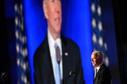 US President-elect Joe Biden delivers remarks in Wilmington, Delaware, on November 7, 2020, after being declared the winner of the presidential election. - Democrat Joe Biden was declared winner of the US presidency November 7, defeating Donald Trump and ending an era that convulsed American politics, shocked the world and left the United States more divided than at any time in decades. (Photo by ANGELA WEISS / AFP)<!-- NICAID(14637492) -->