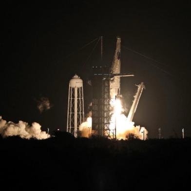 A SpaceX Falcon 9 rocket lifts off from launch complex 39A at the Kennedy Space Center in Florida on November 15, 2020. - NASAs SpaceX Crew-1 mission is the first crew rotation mission of the SpaceX Crew Dragon spacecraft and Falcon 9 rocket to the International Space Station as part of the agencys Commercial Crew Program. NASA astronauts Mike Hopkins, Victor Glover, and Shannon Walker, and astronaut Soichi Noguchi of the Japan Aerospace Exploration Agency (JAXA) are scheduled to launch at 7:27 p.m. EST on November 15, from Launch Complex 39A at the Kennedy Space Center. (Photo by Gregg Newton / AFP)<!-- NICAID(14644451) -->