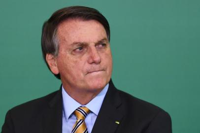 Brazilian President Jair Bolsonaro gestures during the commemoration of the 54th anniversary of the creation of Brazils Tourism Board (EMBRATUR) at Planalto Palace in Brasilia, on November 17, 2020. (Photo by EVARISTO SA / AFP)<!-- NICAID(14649871) -->