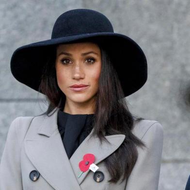 Meghan Markle, the US fiancee of Britains Prince Harry, attends an Anzac Day dawn service at Hyde Park Corner in London on April 25, 2018. Anzac Day commemorates Australian and New Zealand casualties and veterans of conflicts and marks the anniversary of the landings in the Dardanelles on April 25, 1915 that would signal the start of the Gallipoli Campaign during the First World War.  / AFP PHOTO / POOL AND AFP PHOTO / Tolga AKMEN