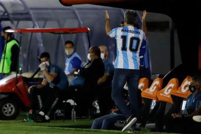  Brazils Gremio coach Renato Gaucho wears a jersey in homage to the late Diego Maradona, during the closed-door Copa Libertadores round before the quarterfinals football match against Paraguays Guarani at the Defensores del Chaco stadium in Asuncion, on November 26, 2020. (Photo by Nathalia AGUILAR / POOL / AFP)Editoria: SPOLocal: AsuncionIndexador: NATHALIA AGUILARSecao: soccerFonte: POOLFotógrafo: STR<!-- NICAID(14653943) -->