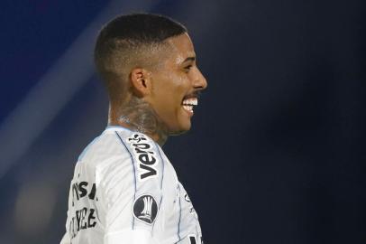  Brazils Gremio Jean Pyerre celebrates after scoring against Paraguays Guarani during their closed-door Copa Libertadores round before the quarterfinals football match at the Defensores del Chaco stadium in Asuncion, on November 26, 2020. (Photo by Nathalia Aguilar / POOL / AFP)Editoria: SPOLocal: AsuncionIndexador: NATHALIA AGUILARSecao: soccerFonte: POOLFotógrafo: STR<!-- NICAID(14654041) -->