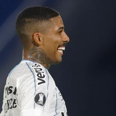  Brazils Gremio Jean Pyerre celebrates after scoring against Paraguays Guarani during their closed-door Copa Libertadores round before the quarterfinals football match at the Defensores del Chaco stadium in Asuncion, on November 26, 2020. (Photo by Nathalia Aguilar / POOL / AFP)Editoria: SPOLocal: AsuncionIndexador: NATHALIA AGUILARSecao: soccerFonte: POOLFotógrafo: STR<!-- NICAID(14654041) -->