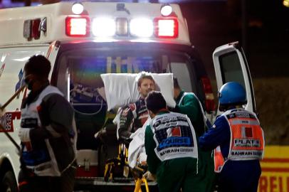  Medics attend to Haas F1s French driver Romain Grosjean (3rd-L) after a crash at the start of the Bahrain Formula One Grand Prix at the Bahrain International Circuit in the city of Sakhir on November 29, 2020. (Photo by HAMAD I MOHAMMED / POOL / AFP)Editoria: SPOLocal: SakhirIndexador: HAMAD I MOHAMMEDSecao: motor racingFonte: POOLFotógrafo: STF<!-- NICAID(14655826) -->