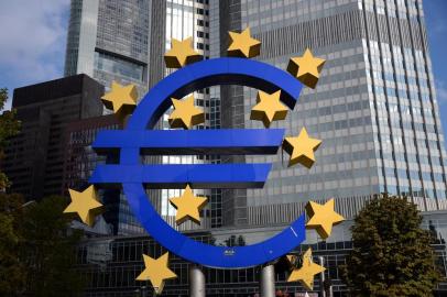 A giant logo of the Euro currency stands in front of the European Central Bank (ECB) in the banking district of Frankfurt, western Germany, on October  9, 2012.  The European Central Bank said Tuesday it will not simply print money to solve the eurozone debt crisis, but noted that Greece has made significant progress in tackling its deep financial problems.AFP/ JOHANNES EISELE<!-- NICAID(8704828) -->