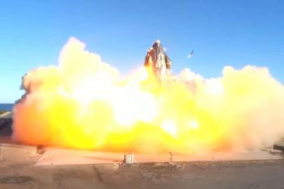 This SpaceX video frame grab image shows SpaceXs Starship SN8 rocket prototype crashing on landing at the companys Boca Chica, Texas facility during an attempted high-altitude launch test on December 9, 2020. (Photo by - / various sources / AFP) / RESTRICTED TO EDITORIAL USE - MANDATORY CREDIT AFP PHOTO / SPACE X  - NO MARKETING - NO ADVERTISING CAMPAIGNS - DISTRIBUTED AS A SERVICE TO CLIENTS<!-- NICAID(14665269) -->