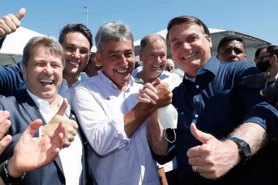 Na frente: Bibo Nunes, Sebastião Melo e Jair BolsonaroAo fundo: Tenete Coronel Zucco e Alceu Moreirainauguração da ponte do guaíba<!-- NICAID(14665328) -->