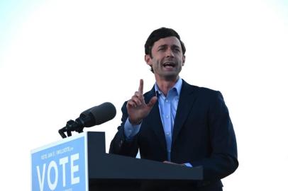 (FILES) In this file photo Democratic candidate for Senate Jon Ossoff speaks ahead of US President-elect Joe Biden outside Center Parc Stadium in Atlanta, Georgia, on January 4, 2021. - Democrat Jon Ossoff on January 6, 2021 claimed victory in the second of two Georgia run-off votes, claiming a win that would give President-elect Joe Biden control of the United States Senate. Georgia, thank so much for the confidence you have placed in me. I am honored by your support, by your confidence, by your trust and I will look forward to serving you, Ossoff said in a televised statement. (Photo by JIM WATSON / AFP)<!-- NICAID(14685161) -->