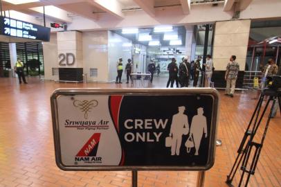 A crew-only area for Indonesian carrier Sriwijaya Air is seen at the Soekarno-Hatta international airport in Tangerang near Jakarta on January 9, 2021, after contact with Sriwijaya Air flight SJY182 bound for Pontianak from Jakarta was lost and feared to have crashed into the sea shortly after take-off. (Photo by Demy Sanjaya / AFP)<!-- NICAID(14687048) -->