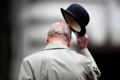 (FILES) In this file photo taken on August 02, 2017 Britains Prince Philip, Duke of Edinburgh, in his role as Captain General, Royal Marines, attends a Parade to mark the finale of the 1664 Global Challenge on the Buckingham Palace Forecourt in central London on August 2, 2017. - Queen Elizabeth IIs husband Britains Prince Philip, Duke of Edinburgh has died, Buckingham Palace announced on April 9, 2021. (Photo by HANNAH MCKAY / POOL / AFP)<!-- NICAID(14753900) -->