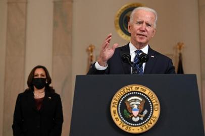 Vice President Kamala Harris (L) listens as US President Joe Biden delivers remarks on the guilty verdict against former policeman Derek Chauvin at the White House in Washington, DC, on April 20, 2021. - Derek Chauvin, a white former Minneapolis police officer, was convicted on April 20 of murdering African-American George Floyd after a racially charged trial that was seen as a pivotal test of police accountability in the United States. (Photo by Brendan SMIALOWSKI / AFP)<!-- NICAID(14763160) -->