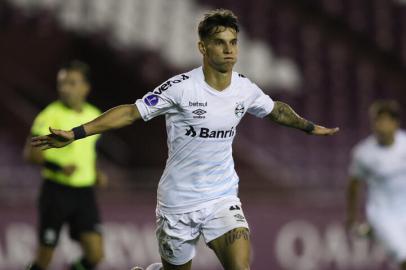 Brazils Gremio Ferreira celebrates after scoring against Argentinas Lanus during the Copa Sudamericana football tournament group stage match at La Fortaleza stadium in Lanus, Buenos Aires Province, on April 29, 2021. (Photo by AGUSTIN MARCARIAN / various sources / AFP)Editoria: SPOLocal: LanusIndexador: AGUSTIN MARCARIANSecao: soccerFonte: AFPFotógrafo: STR<!-- NICAID(14770474) -->